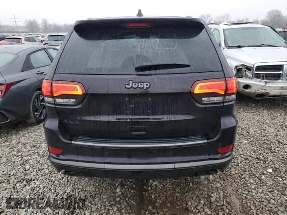 2018 Jeep Grand Cherokee Overland with VIN 1C4RJFCT3JC268599, listed as a Copart auction lot 85242404 with 58,018 mi miles and Salvage title. Bid and sale history available at DreamBid. Image 6.