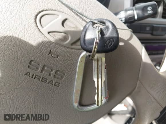 2005 Hyundai Accent GLS z VIN KMHCG35C35U361960, wystawiony jako IAAI lot #43243568 z przebiegiem 163 217 mil mil oraz . Historia ofert i sprzedaży dostępna na DreamBid. Obrazek 11.