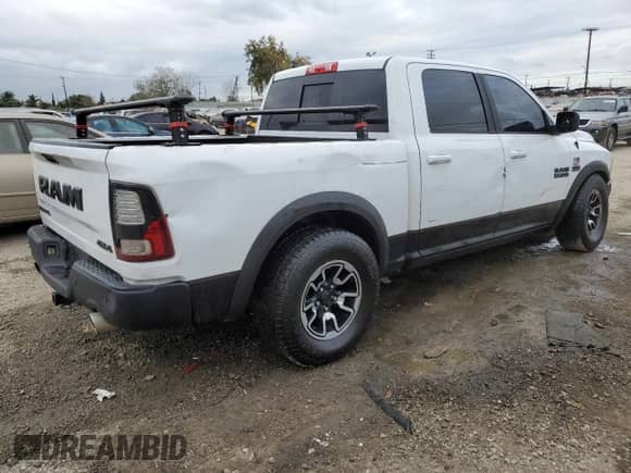 2018 Ram 1500 Rebel с VIN 1C6RR7YT7JS235965, выставлен на аукционе Copart как лот 84749674 с пробегом 61 484 миль миль и Списание • Salvage title. История ставок и продаж доступна на DreamBid. Изображение 3.