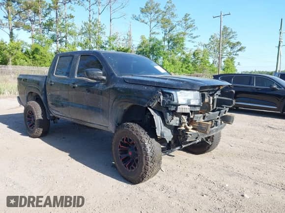 2022 Nissan Frontier S z VIN 1N6ED1EJ6NN682732, wystawiony jako IAAI lot #42170610 z przebiegiem 58 999 mil mil oraz . Historia ofert i sprzedaży dostępna na DreamBid. Obrazek 1.