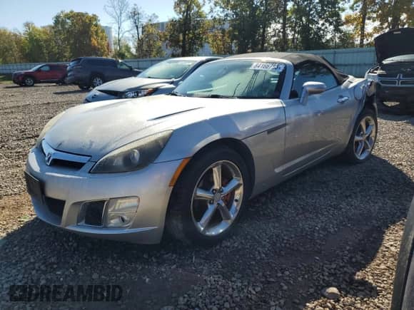 2009 Saturn Sky Red Line с VIN 1G8MT35X59Y104413, выставлен на аукционе Copart как лот 84166785 с пробегом 82 261 миль миль и Списание • Salvage title. История ставок и продаж доступна на DreamBid. Изображение 1.