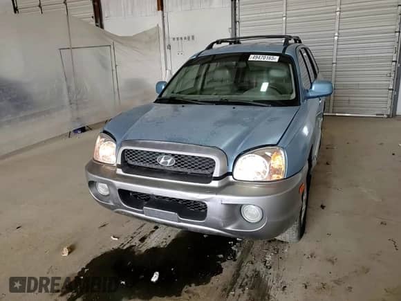 2003 Hyundai Santa Fe LX с VIN KM8SC73E13U559968, выставлен на аукционе Copart как лот 49470165 с пробегом 103 900 миль миль и Списание • Salvage title. История ставок и продаж доступна на DreamBid. Изображение 11.