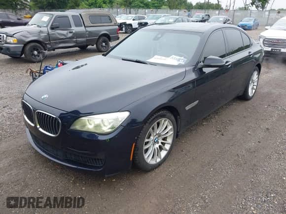 2013 BMW 7 Series 750i xDrive with VIN WBAYB6C50DC998045, listed as a IAAI auction lot 42450110 with 102,068 mi miles and . Bid and sale history available at DreamBid. Image 19.