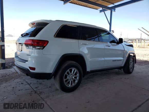 2018 Jeep Grand Cherokee Laredo z VIN 1C4RJEAG7JC480700, wystawiony jako Copart lot #56788835 z przebiegiem Nie podano mil oraz Szkoda całkowita • Salvage title. Historia ofert i sprzedaży dostępna na DreamBid. Obrazek 3.