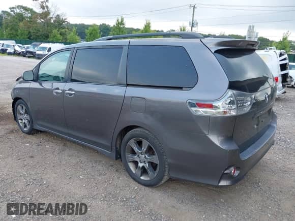 2014 Toyota Sienna SE with VIN 5TDXK3DC8ES440762, listed as a IAAI auction lot 42852260 with 191,156 mi miles and . Bid and sale history available at DreamBid. Image 3.
