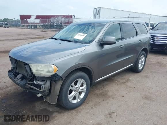 2012 Dodge Durango SXT with VIN 1C4RDJAG9CC181275, listed as a IAAI auction lot 42760696 with 211,805 mi miles and . Bid and sale history available at DreamBid. Image 18.