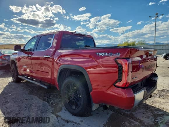 2022 Toyota Tundra Limited with VIN 5TFJA5DB2NX001546, listed as a Copart auction lot 84411785 with 32,693 mi miles and Salvage title. Bid and sale history available at DreamBid. Image 2.