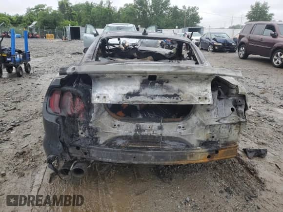 2022 Ford Mustang с VIN NOVIN60861375, выставлен на аукционе Copart как лот 60861375 с пробегом Не указан миль и На запчасти • Non repairable. История ставок и продаж доступна на DreamBid. Изображение 6.