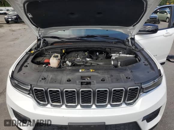 2023 Jeep Grand Cherokee Laredo with VIN 1C4RJHAG6PC513938, listed as a Copart auction lot 64239415 with 26,471 mi miles and Salvage title. Bid and sale history available at DreamBid. Image 12.