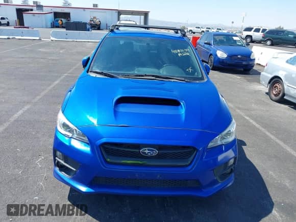 2015 Subaru WRX Premium with VIN JF1VA1D60F9830818, listed as a IAAI auction lot 40010134 with 120,575 mi miles and . Bid and sale history available at DreamBid. Image 12.