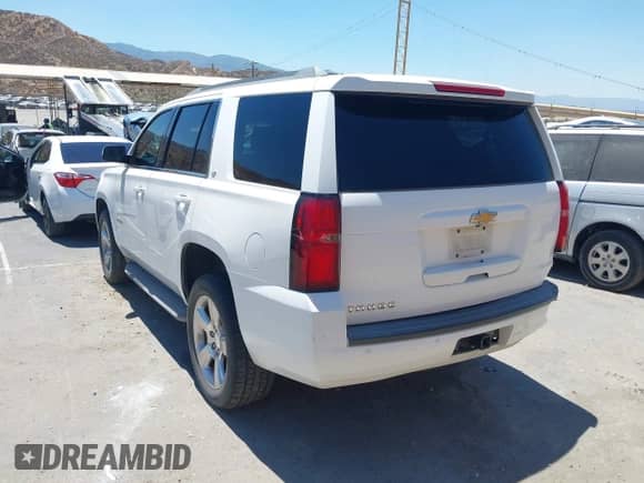 2015 Chevrolet Tahoe LT with VIN 1GNSCBKC4FR256740, listed as a IAAI auction lot 42942137 with 228,463 mi miles and . Bid and sale history available at DreamBid. Image 3.