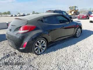 2012 Hyundai Veloster w/Black Int z VIN KMHTC6AD3CU053566, wystawiony jako IAAI lot #43349585 z przebiegiem 137 240 mil mil oraz . Historia ofert i sprzedaży dostępna na DreamBid. Obrazek 4.