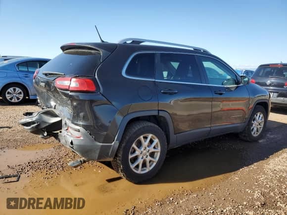 2014 Jeep Cherokee Latitude with VIN 1C4PJMCS9EW126037, listed as a Copart auction lot 81090325 with 86,721 mi miles and Salvage title. Bid and sale history available at DreamBid. Image 3.