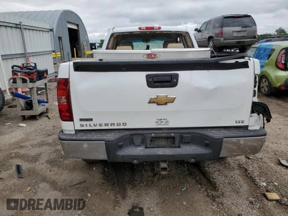 2010 Chevrolet Silverado 1500 LTZ with VIN 1GCSCTE08AZ208747, listed as a Copart auction lot 58322035 with 436,956 mi miles and Salvage title. Bid and sale history available at DreamBid. Image 6.