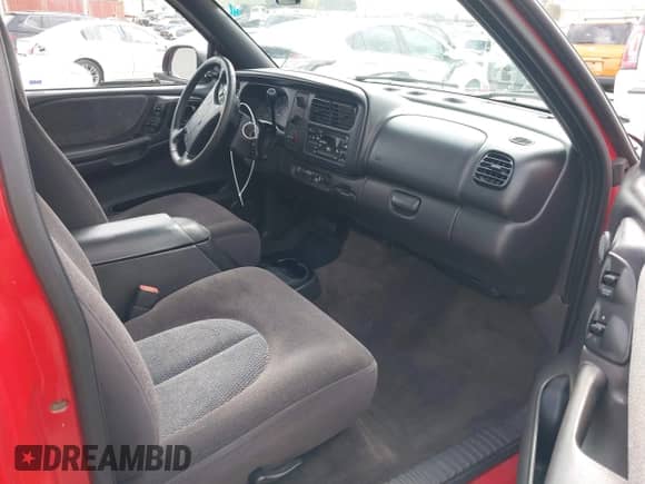 1999 Dodge Dakota SLT with VIN 1B7GL26Z5XS217114, listed as a IAAI auction lot 43418147 with 145,280 mi miles and . Bid and sale history available at DreamBid. Image 5.