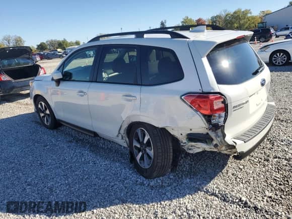 2018 Subaru Forester Premium z VIN JF2SJAEC2JH571704, wystawiony jako Copart lot #87062545 z przebiegiem 103 181 mil mil oraz Szkoda całkowita • Salvage title. Historia ofert i sprzedaży dostępna na DreamBid. Obrazek 2.