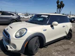 2015 MINI Hardtop S with VIN WMWXP7C52F2A36487, listed as a Copart auction lot 50276035 with 185,895 mi miles and Salvage title. Bid and sale history available at DreamBid. Image 1.