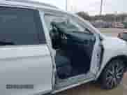 2022 Honda Pilot Touring 8-Passenger with VIN 5FNYF5H99NB001383, listed as a IAAI auction lot 41389422 with 56,055 mi miles and . Bid and sale history available at DreamBid. Image 6.