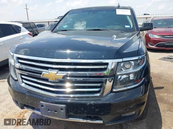 2018 Chevrolet Tahoe LT z VIN 1GNSKBKC3JR101172, wystawiony jako IAAI lot #42760851 z przebiegiem 124 409 mil mil oraz . Historia ofert i sprzedaży dostępna na DreamBid. Obrazek 12.