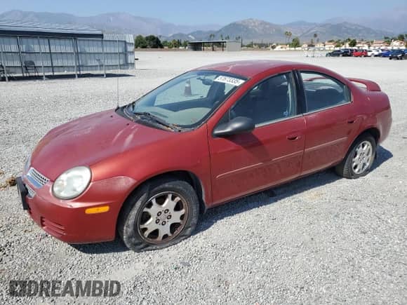 2005 Dodge Neon SXT with VIN 1B3ES56C75D186166, listed as a Copart auction lot 57673335 with 131,345 mi miles and Salvage title. Bid and sale history available at DreamBid. Image 1.