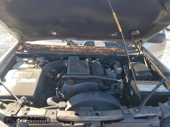 2002 Chevrolet TrailBlazer EXT LT z VIN 1GNET16S826116064, wystawiony jako Copart lot #86149764 z przebiegiem 134 917 mil mil oraz Szkoda całkowita • Salvage title. Historia ofert i sprzedaży dostępna na DreamBid. Obrazek 13.