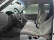 2004 Ford F-150 XL with VIN 2FTRX18W84CA47177, listed as a Copart auction lot 84593925 with 132,079 mi miles and Salvage title. Bid and sale history available at DreamBid. Image 7.