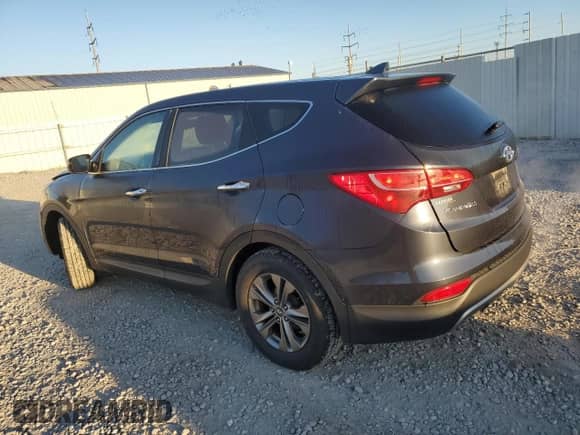 2014 Hyundai Santa Fe with VIN 5XYZT3LB2EG161853, listed as a Copart auction lot 70506955 with 144,512 mi miles and Salvage title. Bid and sale history available at DreamBid. Image 2.