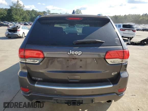 2017 Jeep Grand Cherokee Overland with VIN 1C4RJECGXHC916964, listed as a Copart auction lot 80358275 with 169,868 mi miles and Salvage title. Bid and sale history available at DreamBid. Image 6.
