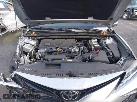 2021 Toyota Camry LE z VIN 4T1C11AK7MU545056, wystawiony jako IAAI lot #41264701 z przebiegiem 59 306 mil mil oraz . Historia ofert i sprzedaży dostępna na DreamBid. Obrazek 10.