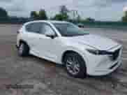 2024 Mazda CX-5 S Preferred z VIN JM3KFBCL3R0456491, wystawiony jako IAAI lot #43289902 z przebiegiem 20 370 mil mil oraz . Historia ofert i sprzedaży dostępna na DreamBid. Obrazek 1.