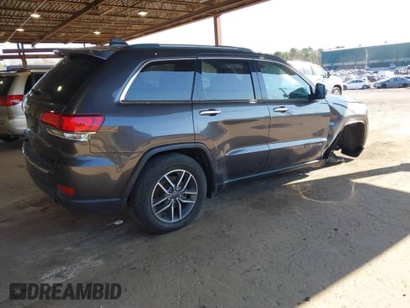2021 Jeep Grand Cherokee 80th Anniversary with VIN 1C4RJFBG1MC828760, listed as a IAAI auction lot 42029388 with 51,287 mi miles and . Bid and sale history available at DreamBid. Image 4.