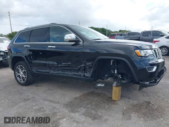 2022 Jeep Grand Cherokee Limited with VIN 1C4RJEBG9NC126665, listed as a IAAI auction lot 41115713 with 34,461 mi miles and . Bid and sale history available at DreamBid. Image 6.