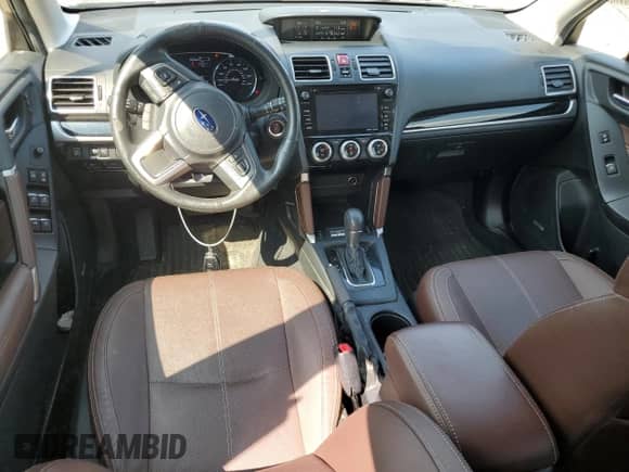 2017 Subaru Forester Touring with VIN JF2SJAWC2HH558055, listed as a Copart auction lot 65933405 with 111,950 mi miles and Salvage title. Bid and sale history available at DreamBid. Image 8.