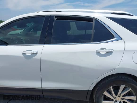 2023 Chevrolet Equinox Premier with VIN 3GNAXNEG3PL102741, listed as a IAAI auction lot 42497764 with 51,289 mi miles and . Bid and sale history available at DreamBid. Image 14.