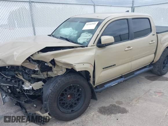 2017 Toyota Tacoma SR5 with VIN 3TMAZ5CN6HM039733, listed as a IAAI auction lot 42332541 with 148,010 mi miles and . Bid and sale history available at DreamBid. Image 17.