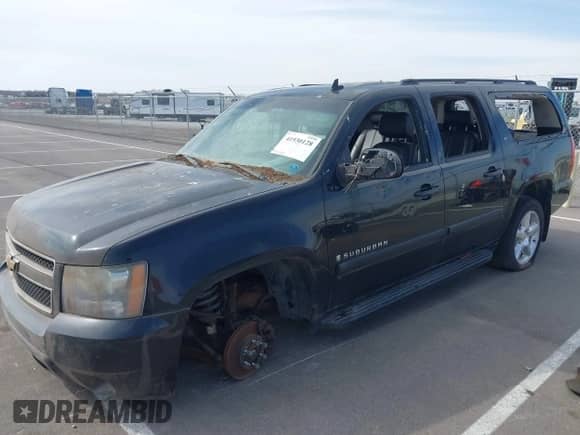 2008 Chevrolet Suburban LTZ z VIN 3GNFK163X8G199732, wystawiony jako IAAI lot #41930128 z przebiegiem 174 767 mil mil oraz . Historia ofert i sprzedaży dostępna na DreamBid. Obrazek 12.