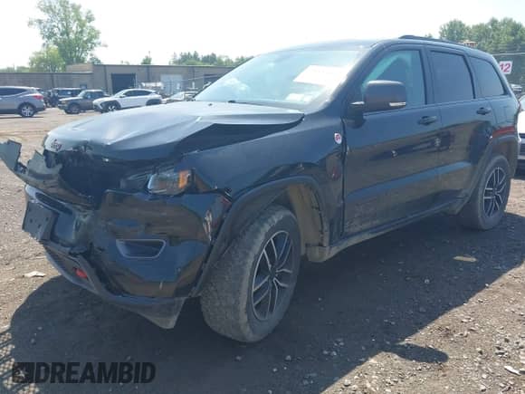 2020 Jeep Grand Cherokee Trailhawk with VIN 1C4RJFLG1LC346674, listed as a IAAI auction lot 42535553 with 84,909 mi miles and . Bid and sale history available at DreamBid. Image 2.