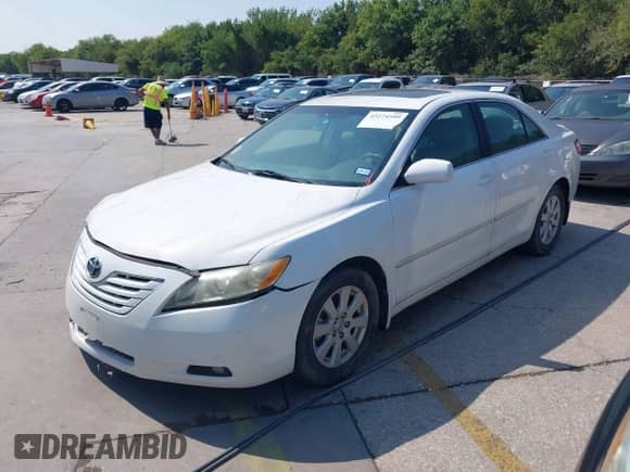 2009 Toyota Camry XLE with VIN 4T1BE46K79U805716, listed as a IAAI auction lot 43274599 with 95,592 mi miles and . Bid and sale history available at DreamBid. Image 2.