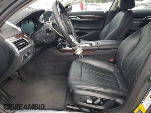 2018 BMW 7 Series 740e xDrive with VIN WBA7J2C51JG938383, listed as a Copart auction lot 74255964 with Not provided miles and Salvage title. Bid and sale history available at DreamBid. Image 7.