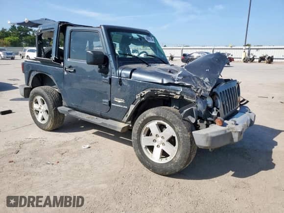 2008 Jeep Wrangler Sahara с VIN 1J4FA54128L605732, выставлен на аукционе Copart как лот 66987395 с пробегом 46 373 миль миль и Списание • Salvage title. История ставок и продаж доступна на DreamBid. Изображение 4.