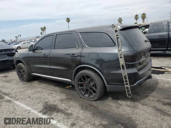 2011 Dodge Durango Crew z VIN 1D4SE4GT0BC631112, wystawiony jako Copart lot #70907055 z przebiegiem Nie podano mil oraz Szkoda całkowita • Salvage title. Historia ofert i sprzedaży dostępna na DreamBid. Obrazek 2.