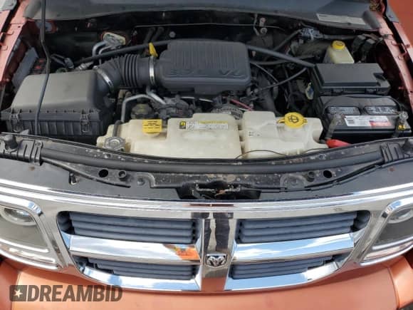2007 Dodge Nitro SLT with VIN 1D8GU58K57W609390, listed as a Copart auction lot 71275105 with 166,051 mi miles and Salvage title. Bid and sale history available at DreamBid. Image 11.