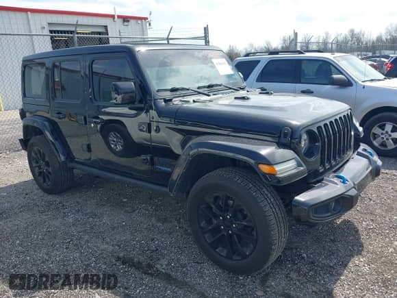 2021 Jeep Wrangler Unlimited Sahara z VIN 1C4JJXP63MW767719, wystawiony jako IAAI lot #41906155 z przebiegiem 44 689 mil mil oraz . Historia ofert i sprzedaży dostępna na DreamBid. Obrazek 1.