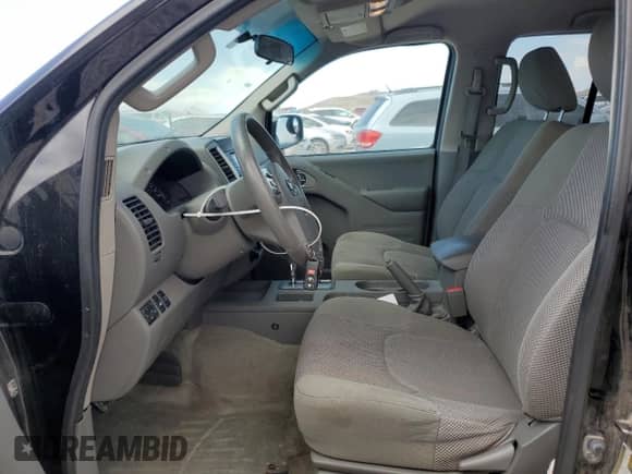 2015 Nissan Frontier SL with VIN 1N6AD0FVXFN736920, listed as a Copart auction lot 68226395 with 145,479 mi miles and Salvage title. Bid and sale history available at DreamBid. Image 7.