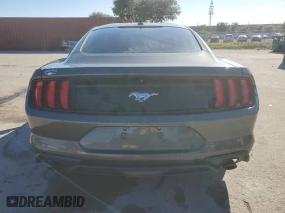 2020 Ford Mustang EcoBoost z VIN 1FA6P8TH9L5183708, wystawiony jako Copart lot #86771585 z przebiegiem 52 725 mil mil oraz Nie do naprawy • Non repairable. Historia ofert i sprzedaży dostępna na DreamBid. Obrazek 6.