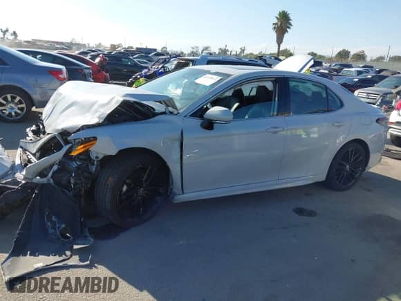 2023 Toyota Camry Hybrid XSE с VIN 4T1K31AK8PU052738, выставлен на аукционе IAAI как лот 43315522 с пробегом 93 968 миль миль и . История ставок и продаж доступна на DreamBid. Изображение 13.