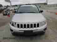 2011 Jeep Compass with VIN 1J4NT1FA6BD173305, listed as a Copart auction lot 87358405 with 112,019 mi miles and Salvage title. Bid and sale history available at DreamBid. Image 5.