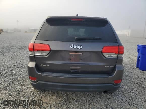 2018 Jeep Grand Cherokee Altitude with VIN 1C4RJEAG7JC339397, listed as a Copart auction lot 82102665 with 64,479 mi miles and Salvage title. Bid and sale history available at DreamBid. Image 6.