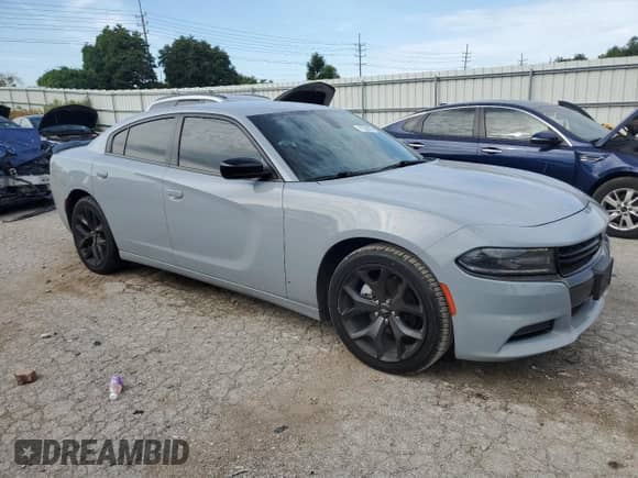 2020 Dodge Charger SXT с VIN 2C3CDXBG1LH241283, выставлен на аукционе Copart как лот 71236575 с пробегом 326 856 миль миль и Списание • Salvage title. История ставок и продаж доступна на DreamBid. Изображение 4.