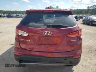 2014 Hyundai Santa Fe z VIN 5XYZU3LB7EG174384, wystawiony jako Copart lot #70334355 z przebiegiem 234 836 mil mil oraz Szkoda całkowita • Salvage title. Historia ofert i sprzedaży dostępna na DreamBid. Obrazek 6.